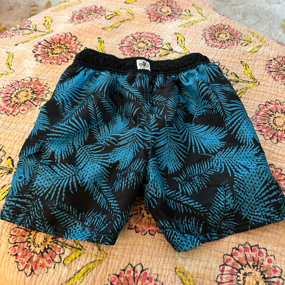 Body Glove palm print bathing suit size 5/6. Used but good condition.